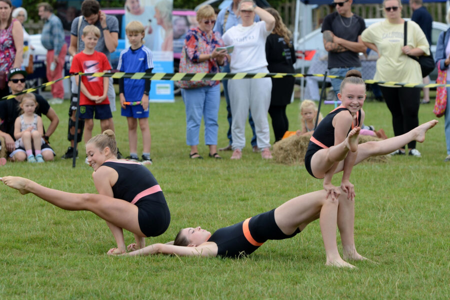 Honiton Gymnastics Club performing in the arena on Allhallows Field on Honiton Market Charter Day 2025