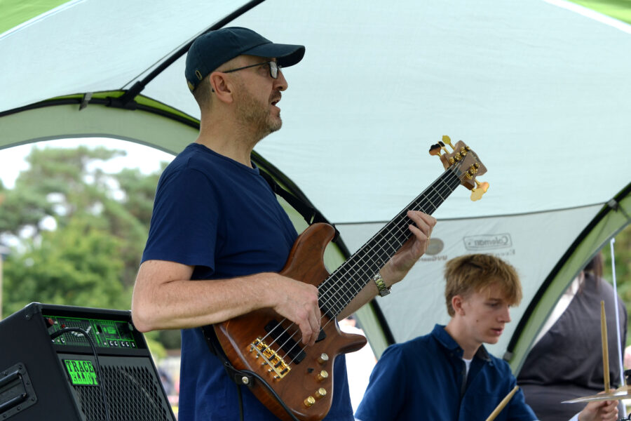 Red Stitches playing on Allhallows Playing Field at Honiton Market Charter Day 2025