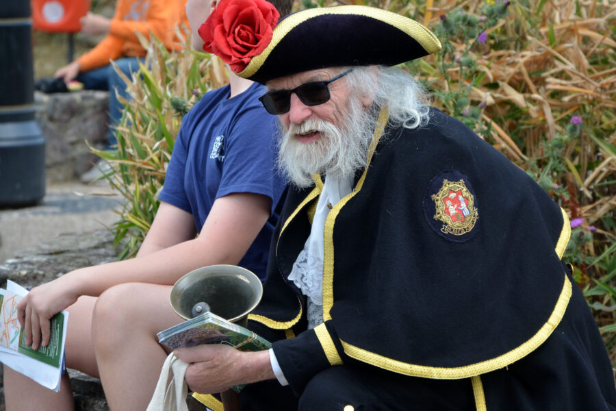 Town Crier Dave Retter taking a break at Honiton Market Charter Day 2025